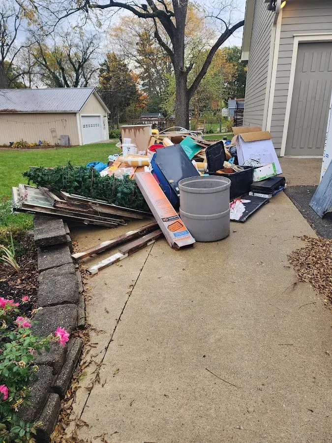 Dumpster being loaded with debris for Residential Dumpster Rental in Union